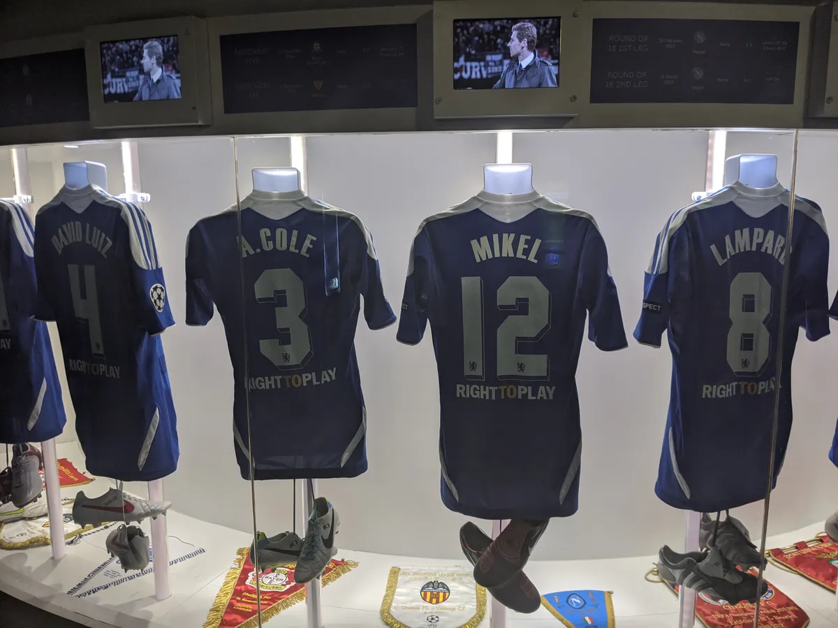 Match-worn shirts in display cases in the Chelsea FC Museum on a Chelsea stadium tour in London